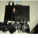 ps2 avec 2 manette en etat neuf